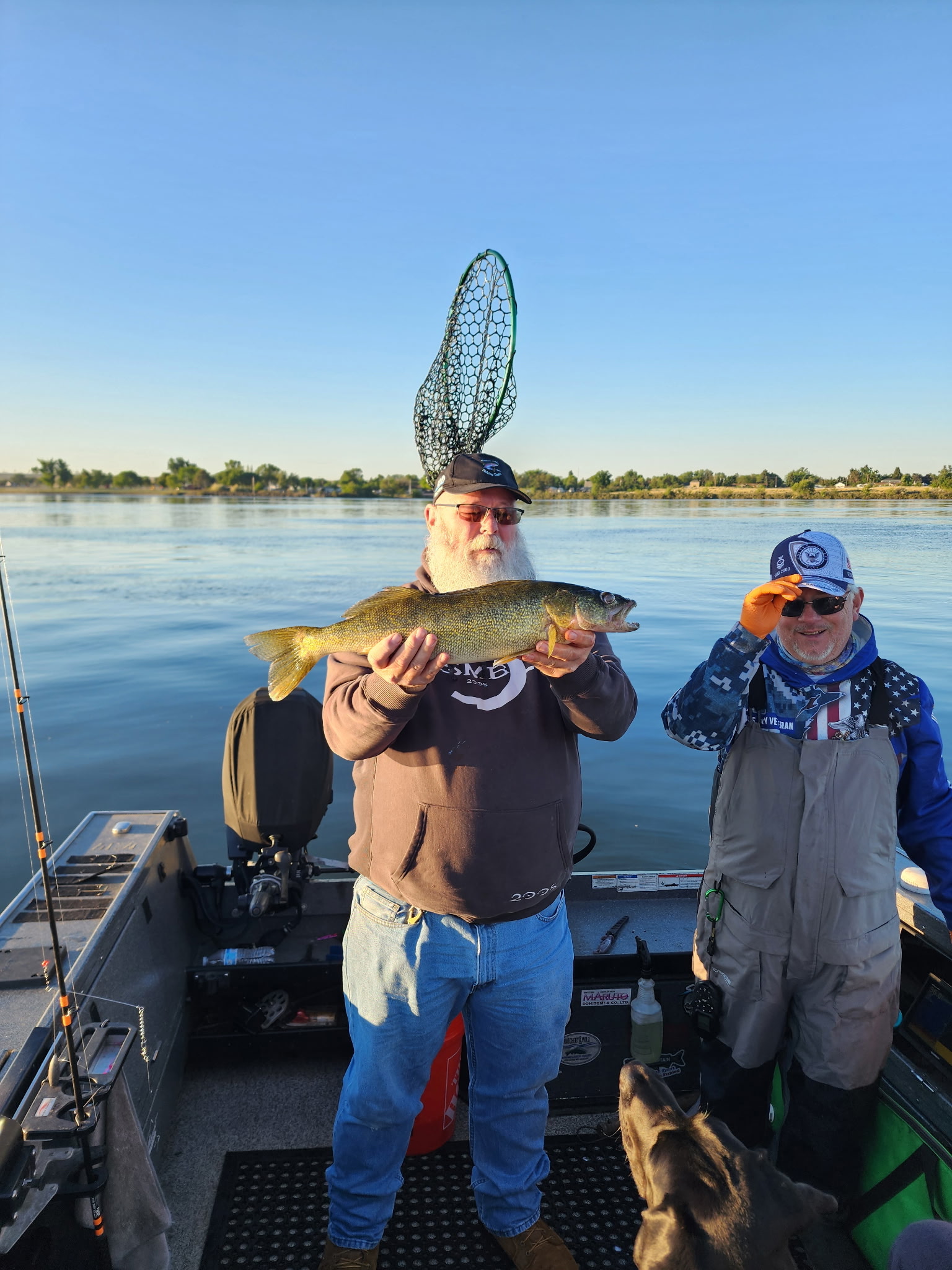 A Vietnam veteran group on Tony's boat in Eastern Oregon, one angler holding a trophy walleye, John Day Pool.